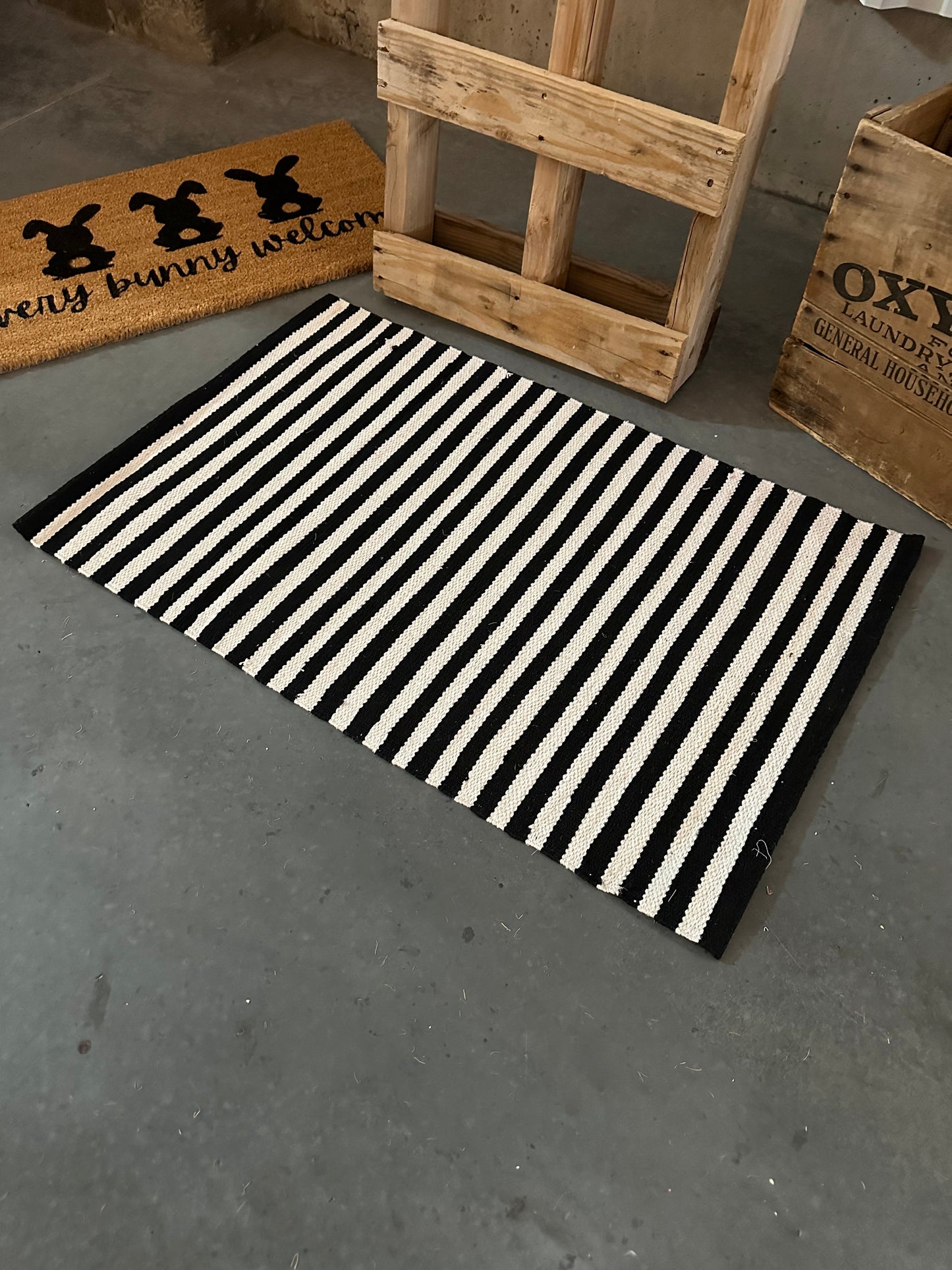 Black and White Striped Layering Rug