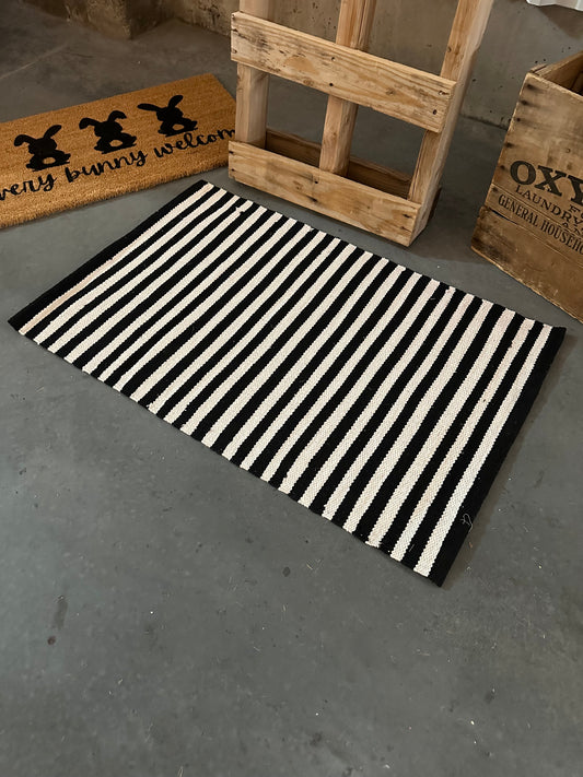 Black and White Striped Layering Rug